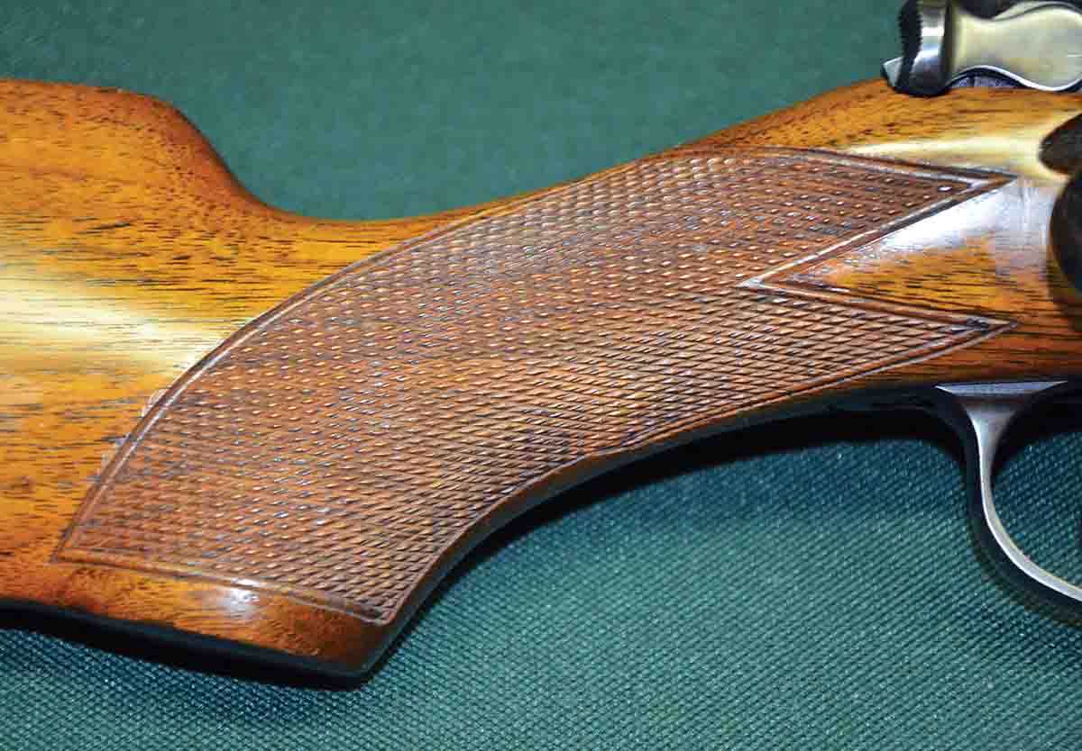 The wrist of the stock was described as half-pistol grip. In those days, checkering was cut by hand. Execution of the 20-line-per-inch checkering is quite good, and it offers a secure grip for the hand.